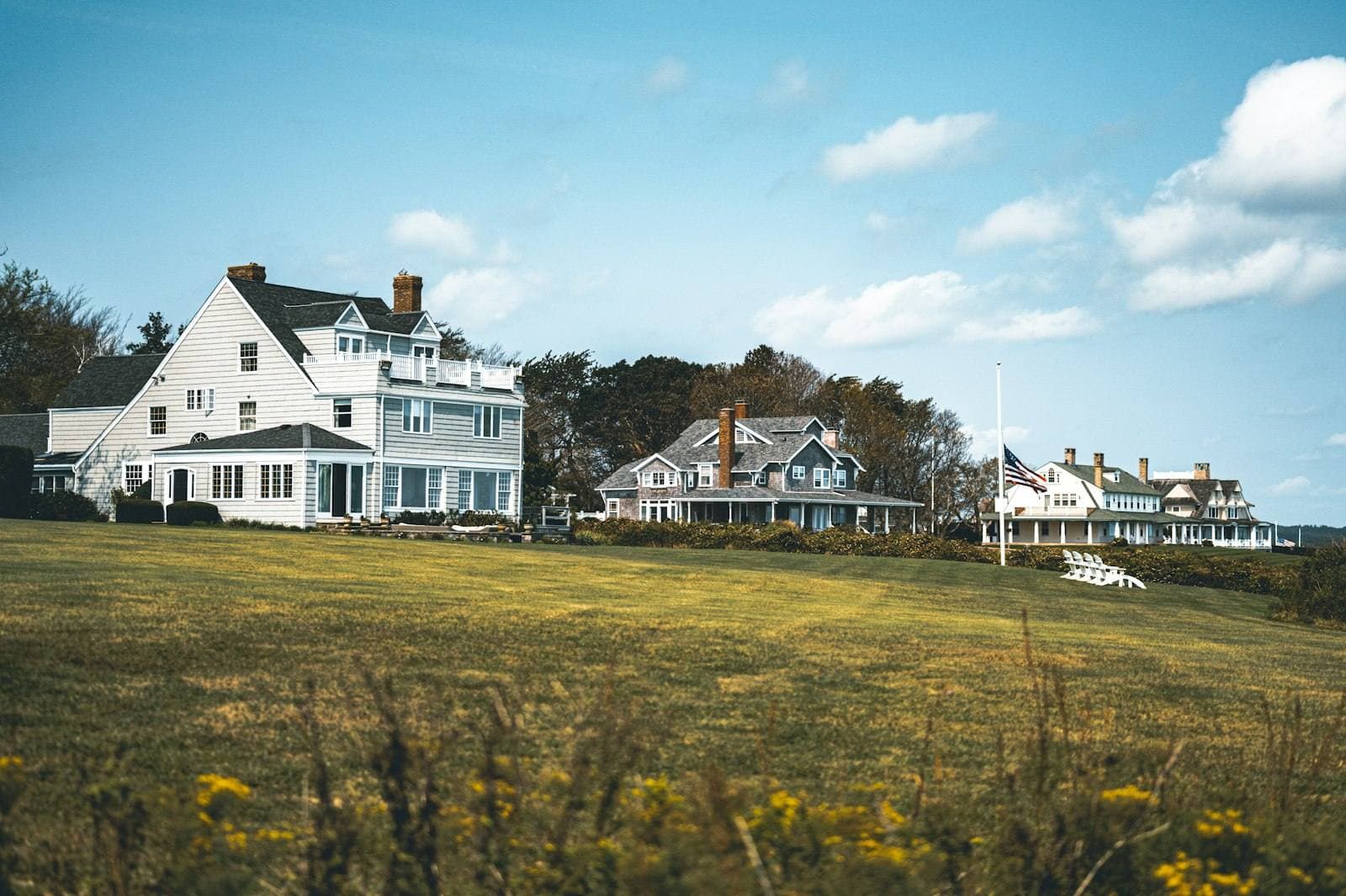 Grand Rhode Island home on open lawn. Kent County appeal guide.